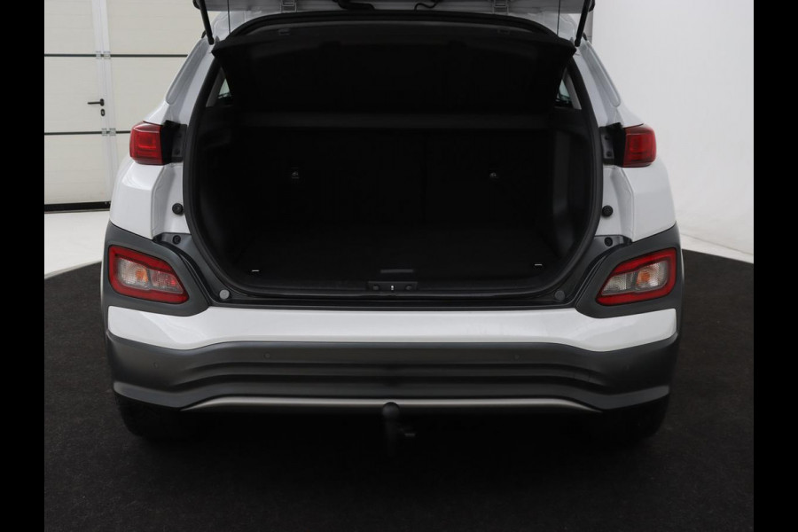 Hyundai Kona EV Comfort 64 kWh | 3-Fase | SOH 98% | Trekhaak | Adaptive cruise | Warmtepomp | Camera | Carplay | Keyless | Navigatie | Climate control