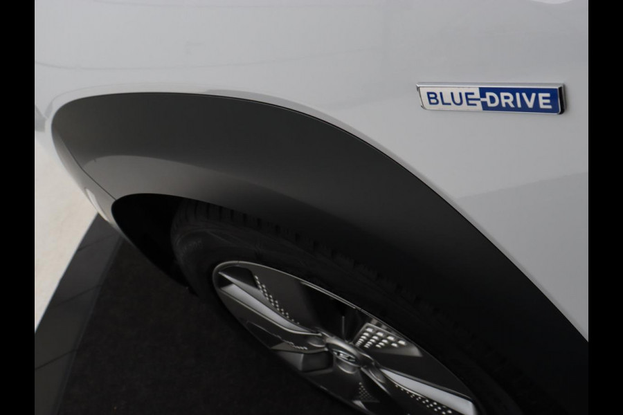 Hyundai Kona EV Comfort 64 kWh | 3-Fase | SOH 98% | Trekhaak | Adaptive cruise | Warmtepomp | Camera | Carplay | Keyless | Navigatie | Climate control