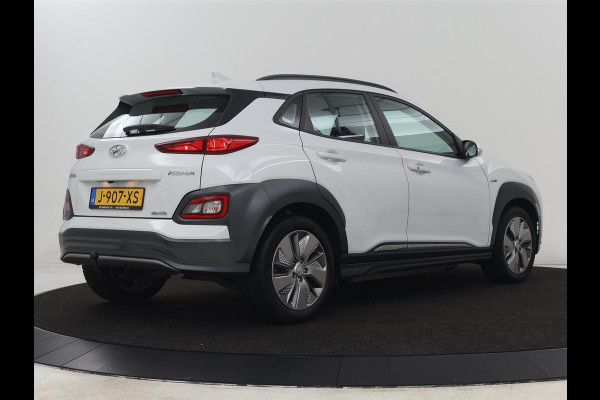 Hyundai Kona EV Comfort 64 kWh | 3-Fase | SOH 98% | Trekhaak | Adaptive cruise | Warmtepomp | Camera | Carplay | Keyless | Navigatie | Climate control