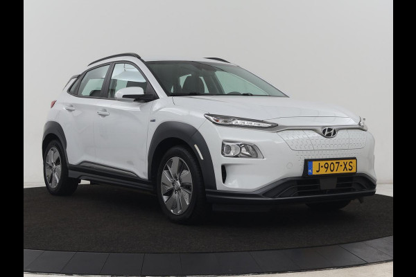 Hyundai Kona EV Comfort 64 kWh | 3-Fase | SOH 98% | Trekhaak | Adaptive cruise | Warmtepomp | Camera | Carplay | Keyless | Navigatie | Climate control