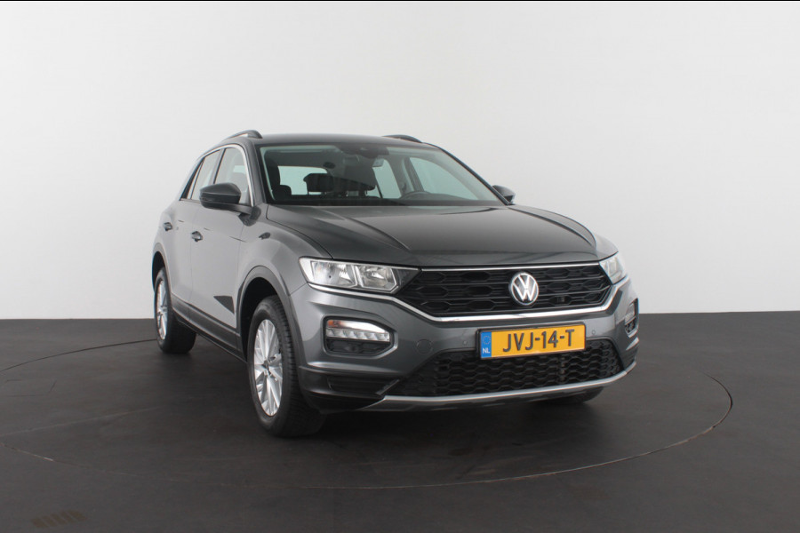Volkswagen T-Roc 1.0 TSI Style > 110pk/Kleur Indium Grey/Parkeersensoren/navi/All season banden