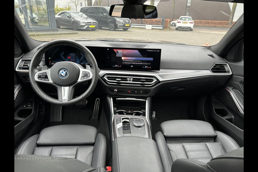 BMW 3 Serie Touring 320e M-SPORT | FACELIFT| PANO|1.STE EIGENAAR, DEALER OH. | LEER | ELEK. TREKHAAK| FABRIEKSGARANTIE T/M 08 2027| LEER| STOELVERWARMING| 19 INCH! SUPER COMPLEET!