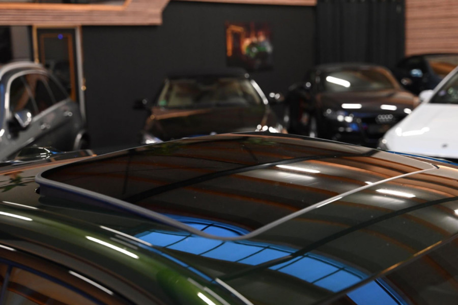 BMW i4 EDrive40 High Executive 84 kWh - M-Sport - Stuurverwarming - Harman Kardon - Adaptive Cruise Control - Schuifdak -