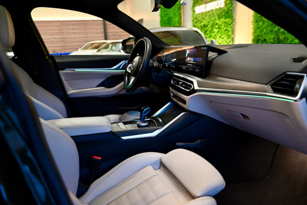 BMW i4 EDrive40 High Executive 84 kWh - M-Sport - Stuurverwarming - Harman Kardon - Adaptive Cruise Control - Schuifdak -