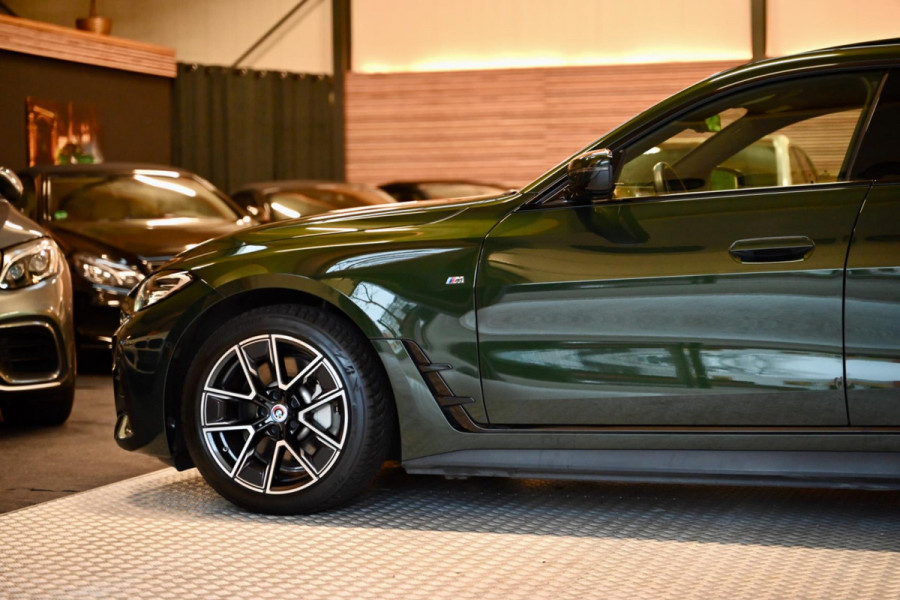 BMW i4 EDrive40 High Executive 84 kWh - M-Sport - Stuurverwarming - Harman Kardon - Adaptive Cruise Control - Schuifdak -