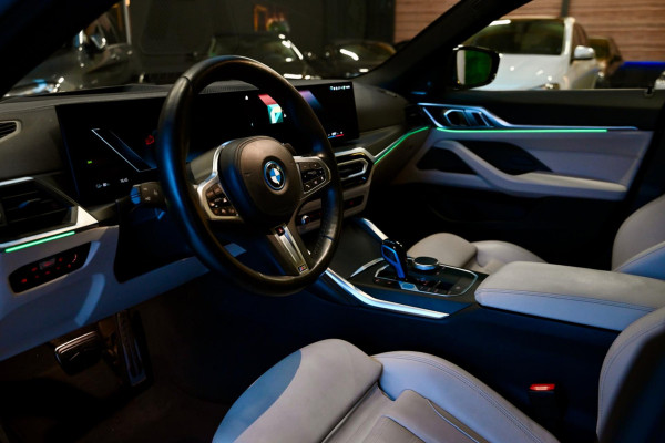 BMW i4 EDrive40 High Executive 84 kWh - M-Sport - Stuurverwarming - Harman Kardon - Adaptive Cruise Control - Schuifdak -