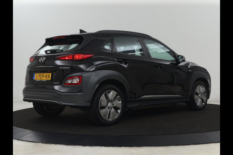 Hyundai Kona EV Comfort 64 kWh | 3-Fase | SOH 100% | Adaptive cruise | Krell Audio | Warmtepomp | Keyless | Parkeerhulp | Digital Cockpit | Climate control