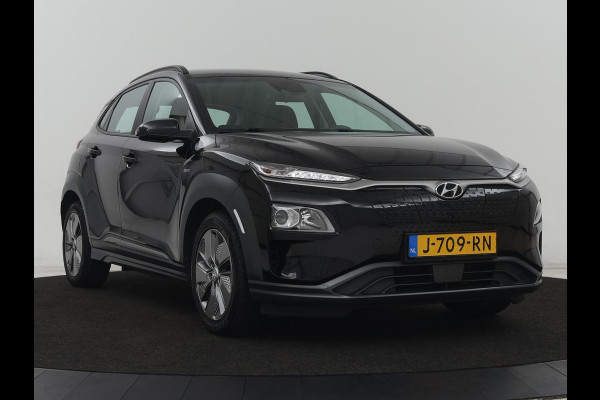 Hyundai Kona EV Comfort 64 kWh | 3-Fase | SOH 100% | Adaptive cruise | Krell Audio | Warmtepomp | Keyless | Parkeerhulp | Digital Cockpit | Climate control