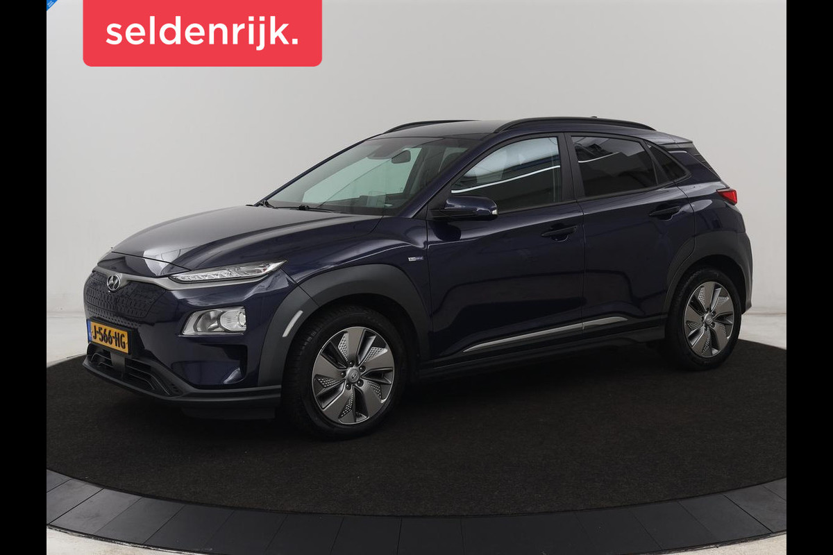 Hyundai Kona EV Fashion 64 kWh | 3-Fase | SOH 100% | Head-Up | Adaptive cruise | Carplay | Warmtepomp | Camera | Krell Audio | Navigatie | Parkeerhulp