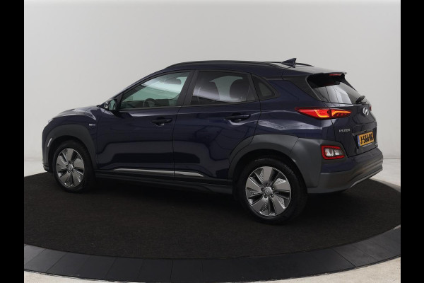 Hyundai Kona EV Fashion 64 kWh | 3-Fase | SOH 100% | Head-Up | Adaptive cruise | Carplay | Warmtepomp | Camera | Krell Audio | Navigatie | Parkeerhulp