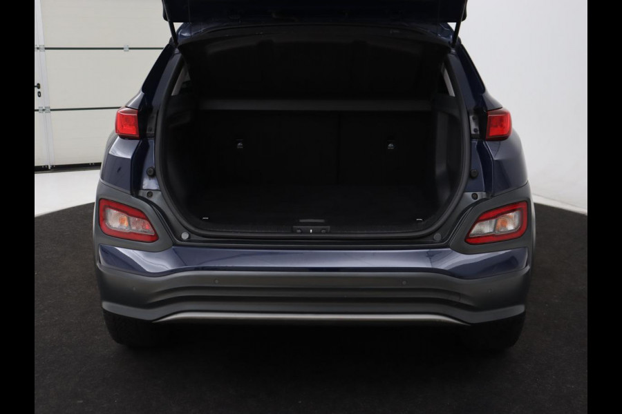 Hyundai Kona EV Fashion 64 kWh | 3-Fase | SOH 100% | Head-Up | Adaptive cruise | Carplay | Warmtepomp | Camera | Krell Audio | Navigatie | Parkeerhulp