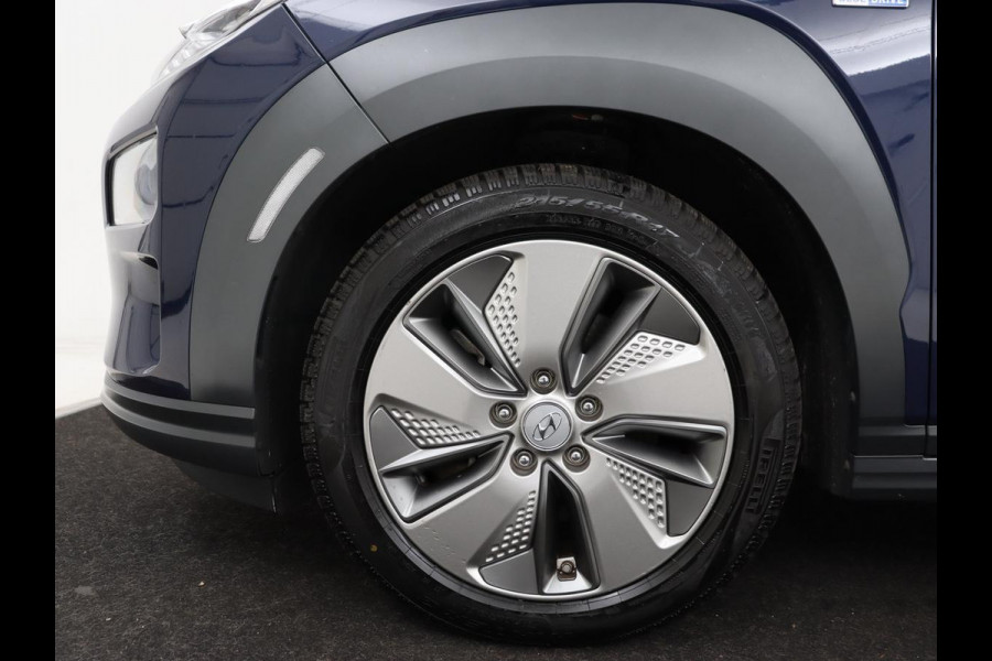 Hyundai Kona EV Fashion 64 kWh | 3-Fase | SOH 100% | Head-Up | Adaptive cruise | Carplay | Warmtepomp | Camera | Krell Audio | Navigatie | Parkeerhulp