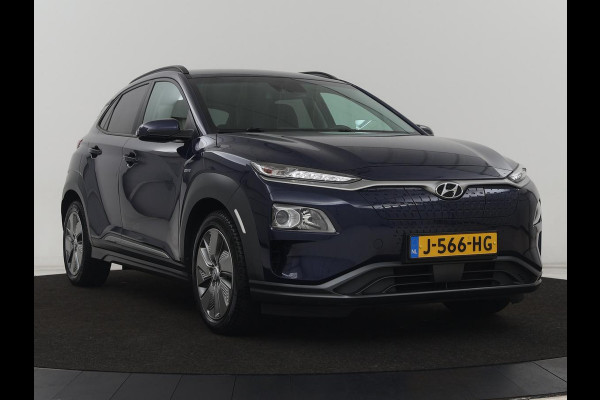 Hyundai Kona EV Fashion 64 kWh | 3-Fase | SOH 100% | Head-Up | Adaptive cruise | Carplay | Warmtepomp | Camera | Krell Audio | Navigatie | Parkeerhulp