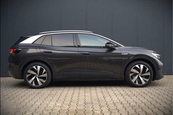 Volkswagen ID.4 First 77 kWh | Stoelverwarming | Stuurverwarming | Trekhaak | Warmtepomp | Adaptive Cruise Control | Navigatie | Apple Carplay | Keyless | Camera | Parkersensoren |