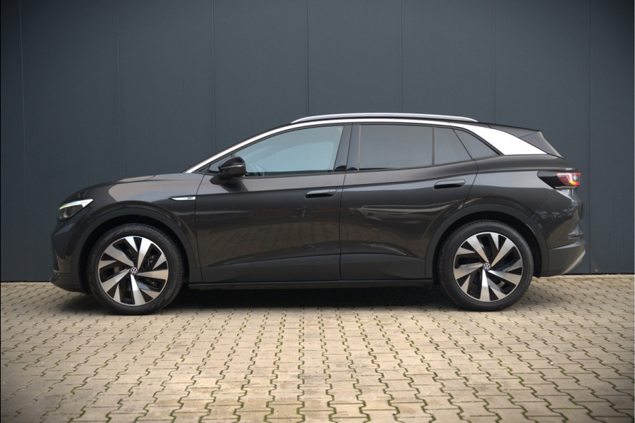 Volkswagen ID.4 First 77 kWh | Stoelverwarming | Stuurverwarming | Trekhaak | Warmtepomp | Adaptive Cruise Control | Navigatie | Apple Carplay | Keyless | Camera | Parkersensoren |