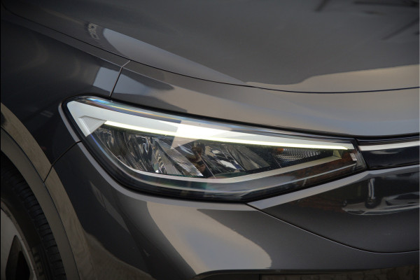 Volkswagen ID.4 First 77 kWh | Stoelverwarming | Stuurverwarming | Trekhaak | Warmtepomp | Adaptive Cruise Control | Navigatie | Apple Carplay | Keyless | Camera | Parkersensoren |
