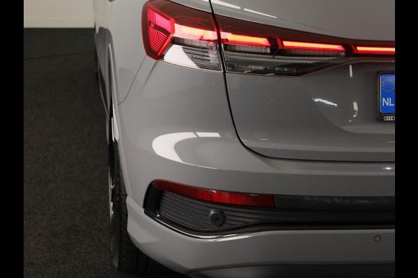 Audi Q4 e-tron 40 Launch edition S Competition 77 kWh 204 pk | SoH 97% | Navigatie | Warmtepomp | Parkeersensoren | Achteruitrijcamera | Stoelverwarming | S-Line |