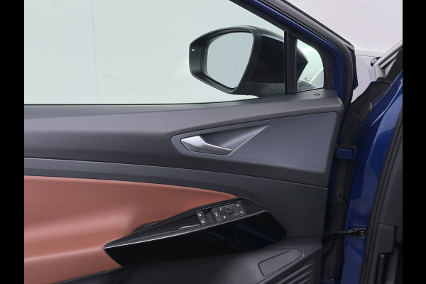 Volkswagen ID.4 First 82kWh SOH 93% Warmtepomp Trekhaak Adap.Cruise Navi Ecc Camera Apple Carplay Android Auto Pdc Lmv  20" Privacy Glas Led Rijstrooksensor Stuur+Stoelverwarming Origineel Nederlandse Auto