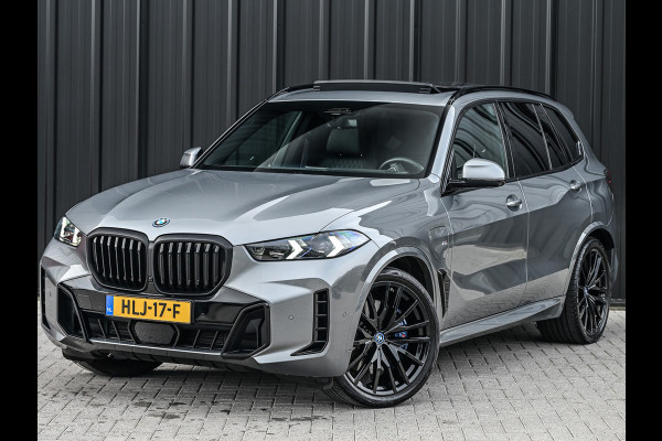 BMW X5 xDrive50e 490pk M Sport Pro | Panorama dak | Luchtvering | Comfort Access | Soft Close | Trekhaak | Shadowline Lights | Comfort Seats | 4-Zone Climate | Driving Assistant Prof. | Harman/Kardon | Ambient Ai