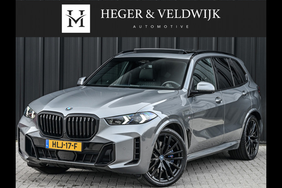 BMW X5 xDrive50e 490pk M Sport Pro | Panorama dak | Luchtvering | Comfort Access | Soft Close | Trekhaak | Shadowline Lights | Comfort Seats | 4-Zone Climate | Driving Assistant Prof. | Harman/Kardon | Ambient Ai