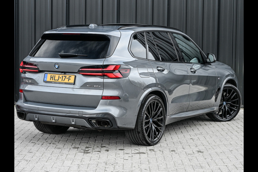 BMW X5 xDrive50e 490pk M Sport Pro | Panorama dak | Luchtvering | Comfort Access | Soft Close | Trekhaak | Shadowline Lights | Comfort Seats | 4-Zone Climate | Driving Assistant Prof. | Harman/Kardon | Ambient Ai
