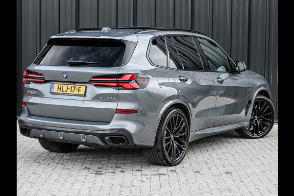 BMW X5 xDrive50e 490pk M Sport Pro | Panorama dak | Luchtvering | Comfort Access | Soft Close | Trekhaak | Shadowline Lights | Comfort Seats | 4-Zone Climate | Driving Assistant Prof. | Harman/Kardon | Ambient Ai