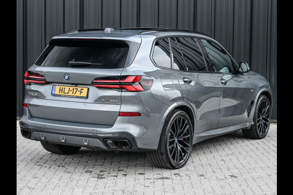 BMW X5 xDrive50e 490pk M Sport Pro | Panorama dak | Luchtvering | Comfort Access | Soft Close | Trekhaak | Shadowline Lights | Comfort Seats | 4-Zone Climate | Driving Assistant Prof. | Harman/Kardon | Ambient Ai