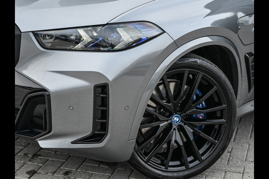 BMW X5 xDrive50e 490pk M Sport Pro | Panorama dak | Luchtvering | Comfort Access | Soft Close | Trekhaak | Shadowline Lights | Comfort Seats | 4-Zone Climate | Driving Assistant Prof. | Harman/Kardon | Ambient Ai