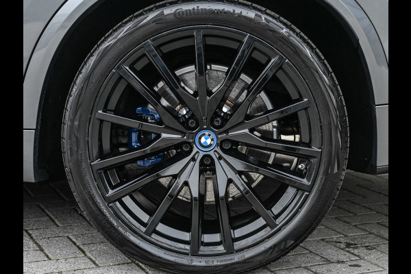 BMW X5 xDrive50e 490pk M Sport Pro | Panorama dak | Luchtvering | Comfort Access | Soft Close | Trekhaak | Shadowline Lights | Comfort Seats | 4-Zone Climate | Driving Assistant Prof. | Harman/Kardon | Ambient Ai