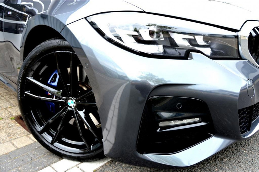 BMW 3-serie 330e High Executive AUT 292PK LED/LEER/NAV/LMV19
