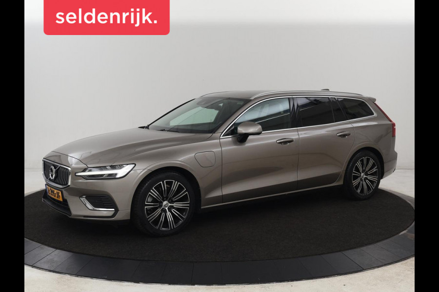 Volvo V60 2.0 T6 AWD Recharge Business Pro | Leder | Trekhaak | Stoel & stuurverwarming | Adaptive cruise | Camera | Carplay | Navigatie | Full LED | Parkeerhulp | PHEV | Plug In