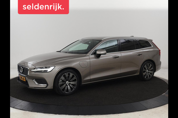 Volvo V60 2.0 T6 AWD Recharge Business Pro | Leder | Trekhaak | Stoel & stuurverwarming | Adaptive cruise | Camera | Carplay | Navigatie | Full LED | Parkeerhulp | PHEV | Plug In