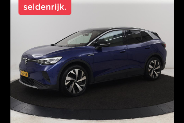 Volkswagen ID.4 First 77 kWh | Trekhaak | Stoel & stuurverwarming | Adaptive cruise | Camera | Carplay | Half leder | Navigatie | 20'' | Full LED | Keyless | Climate control | Sfeerverlichting