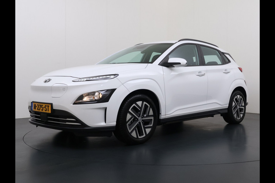 Hyundai Kona EV Comfort 64kWh FACELIFT SOH 100% Fase 3 Laden All-Season Banden Navi Ecc Adap.Cruise Camera Krell®-Audio Apple Carplay Android Keyless Subwoofer Led Lmv Rijstrooksensor Forward Collision-Avoidance Bluetooth 1e Eigenaar Origineel Nederlandse Auto