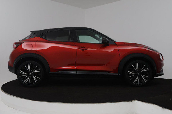 Nissan Juke 1.0 DIG-T Premiere Edition (STOELVERWARMING, ACHTERUITRIJCAMERA, NAVIGATIE, ADAPTIEVE CRUISE, PARKEERSENSOREN)