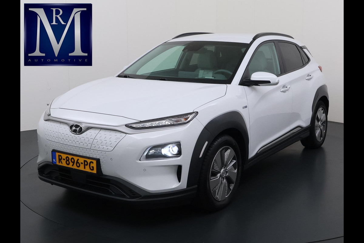 Hyundai Kona EV Premium 64 kWh SOH 100% | 3-FASE | WARMTEPOMP | LEDER | STOEL VERWARM, VENTILATIE | CAMERA | RIJKLAAR INCL. 12 MND BOVAG GARANTIE