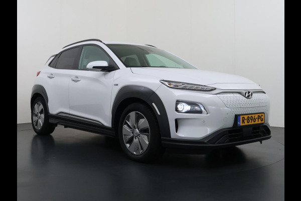 Hyundai Kona EV Premium 64 kWh SOH 100% | 3-FASE | WARMTEPOMP | LEDER | STOEL VERWARM, VENTILATIE | CAMERA | RIJKLAAR INCL. 12 MND BOVAG GARANTIE