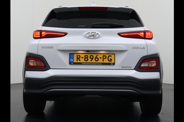 Hyundai Kona EV Premium 64 kWh SOH 100% | 3-FASE | WARMTEPOMP | LEDER | STOEL VERWARM, VENTILATIE | CAMERA | RIJKLAAR INCL. 12 MND BOVAG GARANTIE