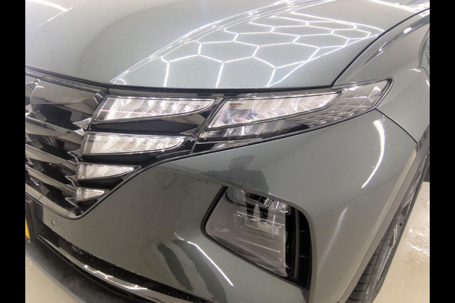 Hyundai Tucson 1.6 T-GDI HEV Premium Sky Automaat | Schuif - Kanteldak | Full Options