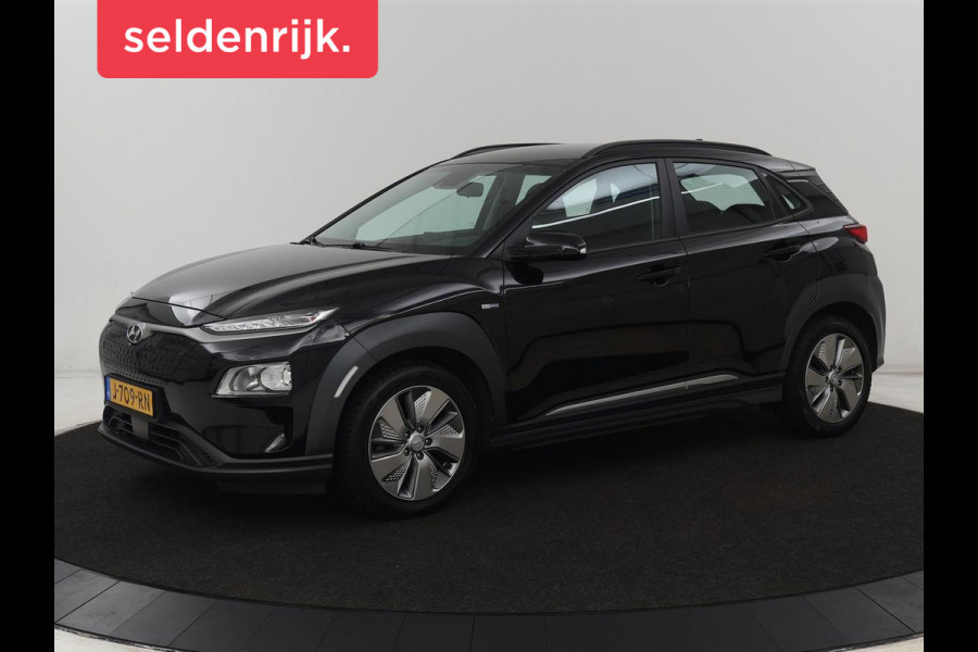 Hyundai Kona EV Comfort 64 kWh | 3-Fase | SOH 100% | Adaptive cruise | Krell Audio | Warmtepomp | Keyless | Parkeerhulp | Digital Cockpit | Climate control