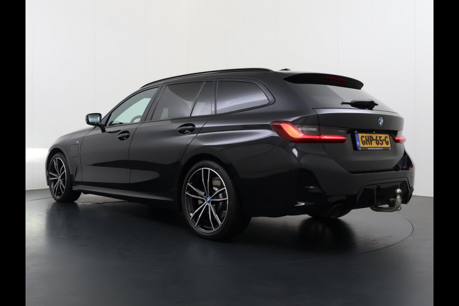 BMW 3 Serie Touring 320e VAN € 42.899,- VOOR € 39.877,- UW LENTEVOORDEEL: €3.022,-! | M-SPORT | FACELIFT| PANO|1.STE EIGENAAR, DEALER OH. | LEER | ELEK. TREKHAAK| FABRIEKSGARANTIE T/M 08 2027| LEER| STOELVERWARMING| 19 INCH! SUPER COMPLEET!