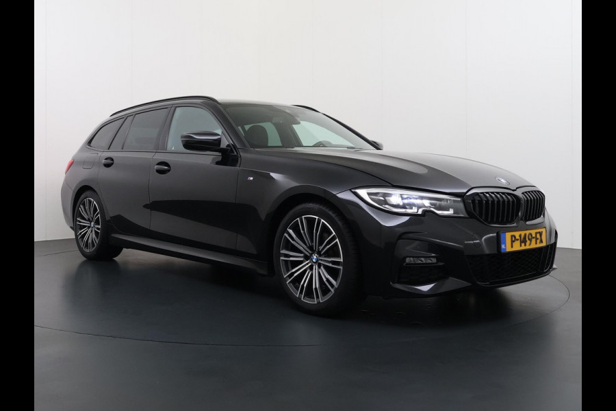BMW 3 Serie Touring 318i High Executive Edition VAN € 34.900,- VOOR € 32.877,- UW LENTEVOORDEEL: maar liefst € 2.023,-!| M Sport | Afneembare trekhaak | Stoelverwarming | Origineel Nederlands geleverd (NAP) | Rijklaar geleverd incl. 12 maanden BOVAG-garantie