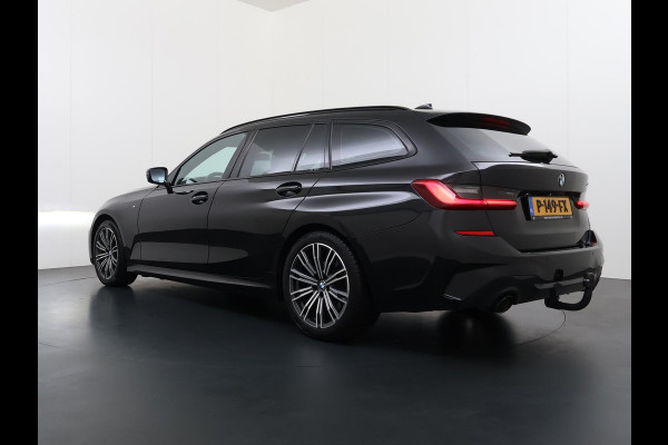 BMW 3 Serie Touring 318i High Executive Edition VAN € 34.900,- VOOR € 32.877,- UW LENTEVOORDEEL: maar liefst € 2.023,-!| M Sport | Afneembare trekhaak | Stoelverwarming | Origineel Nederlands geleverd (NAP) | Rijklaar geleverd incl. 12 maanden BOVAG-garantie