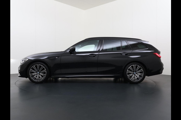 BMW 3 Serie Touring 318i High Executive Edition VAN € 34.900,- VOOR € 32.877,- UW LENTEVOORDEEL: maar liefst € 2.023,-!| M Sport | Afneembare trekhaak | Stoelverwarming | Origineel Nederlands geleverd (NAP) | Rijklaar geleverd incl. 12 maanden BOVAG-garantie
