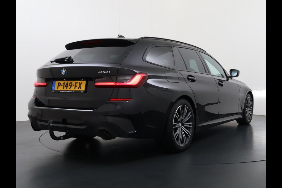 BMW 3 Serie Touring 318i High Executive Edition VAN € 34.900,- VOOR € 32.877,- UW LENTEVOORDEEL: maar liefst € 2.023,-!| M Sport | Afneembare trekhaak | Stoelverwarming | Origineel Nederlands geleverd (NAP) | Rijklaar geleverd incl. 12 maanden BOVAG-garantie