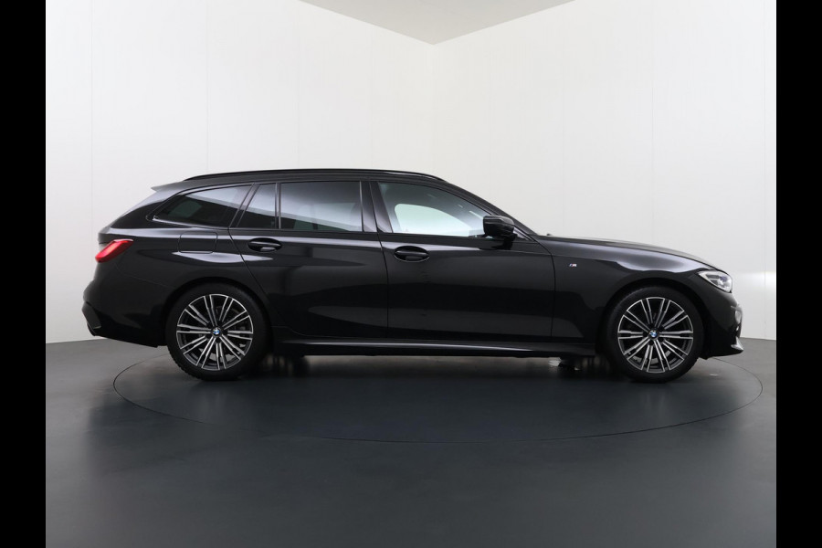 BMW 3 Serie Touring 318i High Executive Edition VAN € 34.900,- VOOR € 32.877,- UW LENTEVOORDEEL: maar liefst € 2.023,-!| M Sport | Afneembare trekhaak | Stoelverwarming | Origineel Nederlands geleverd (NAP) | Rijklaar geleverd incl. 12 maanden BOVAG-garantie