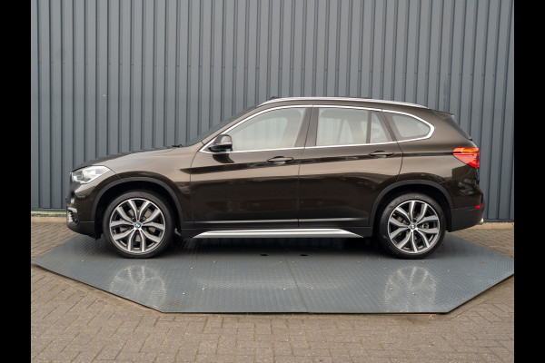 BMW X1 sDrive20i High Executive | Trekhaak afnb. | Panodak | Head Up | Camera | Elk. A-klep | Leder | Prijs Rijklaar!!