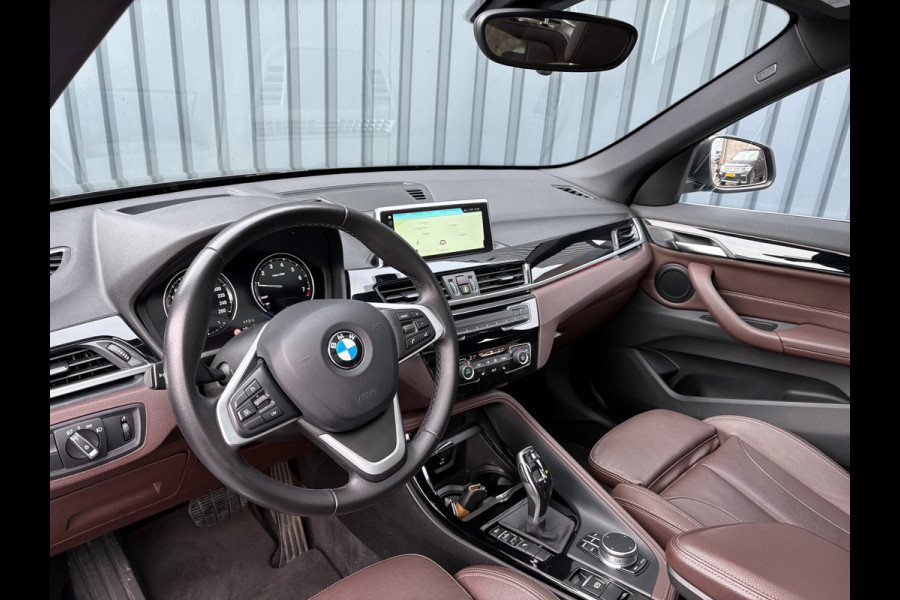 BMW X1 sDrive20i High Executive | Trekhaak afnb. | Panodak | Head Up | Camera | Elk. A-klep | Leder | Prijs Rijklaar!!