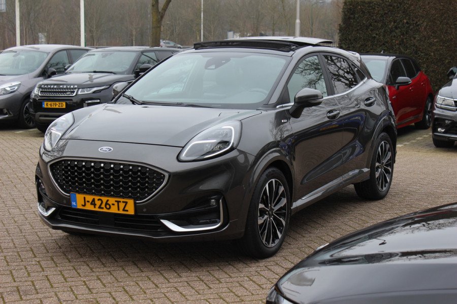 Ford Puma 1.0 EcoBoost Hybrid ST-Line X Vignale 155pk / NL Auto! / Full option! / Trekhaak / Panoramadak / Camera / Leder / CarPlay / B&O / 18'' / Keyless / Stuur+Stoelverwarming / Dodehoek / DAB / Verwarmde voorruit / ACC