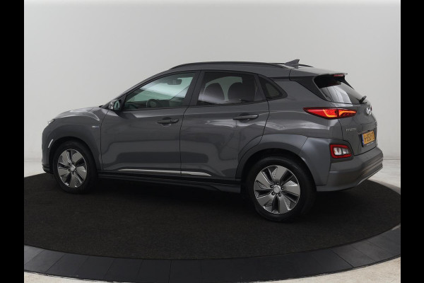 Hyundai Kona EV Premium 64 kWh | SOH 100% | 3 Fase | Stoelventilatie | Head-Up | Leder | Adaptive cruise | Carplay | Stoelverwarming | Navigatie | Keyless | Climate control